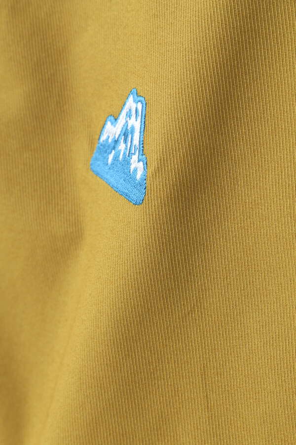 ポリエステルコットン ストレッチツイル 総柄刺繍 キャンプモチーフワッペン風 スカート