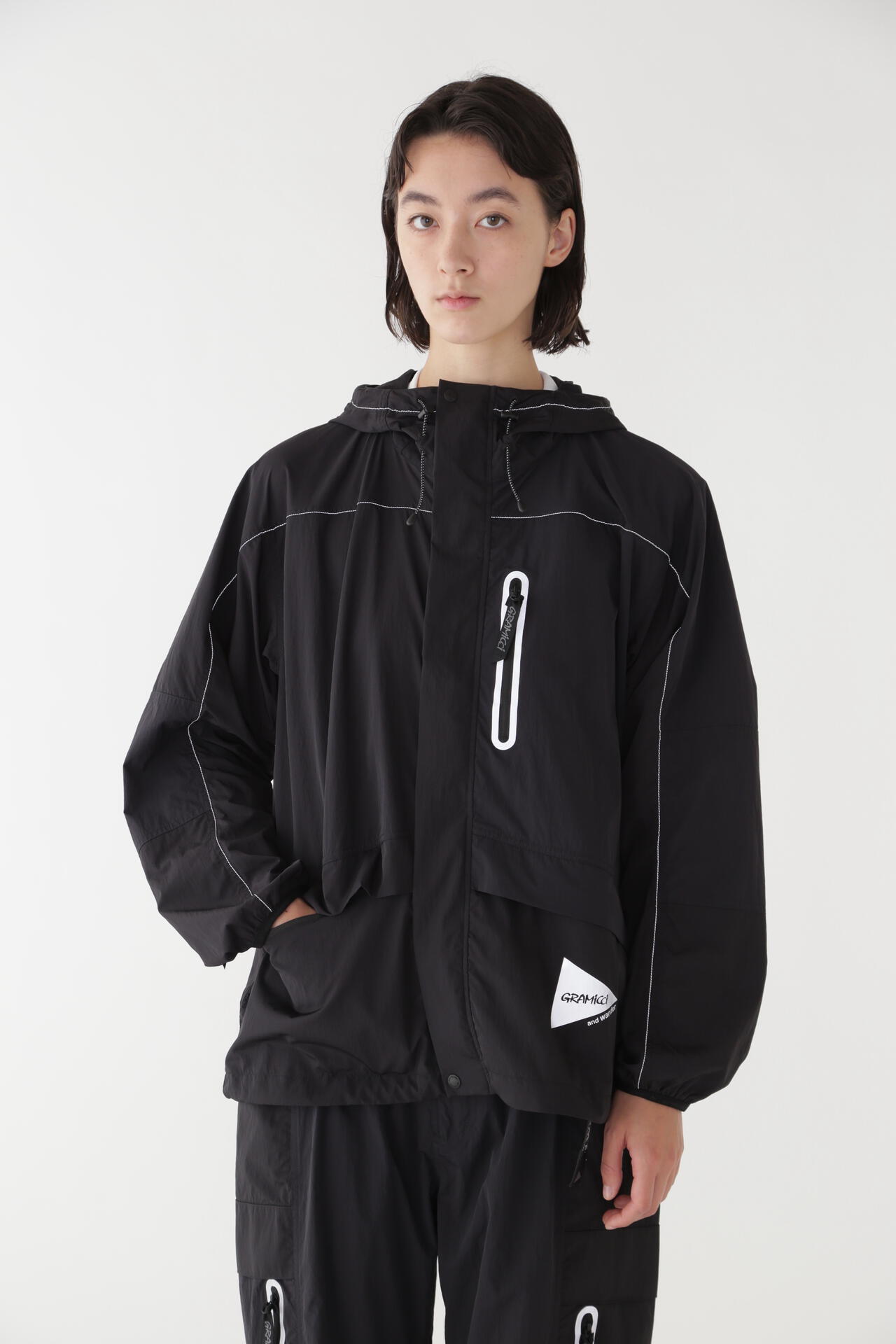 GRAMICCI × and wander PATCHWORK WIND HOODIE | outerwear | and 