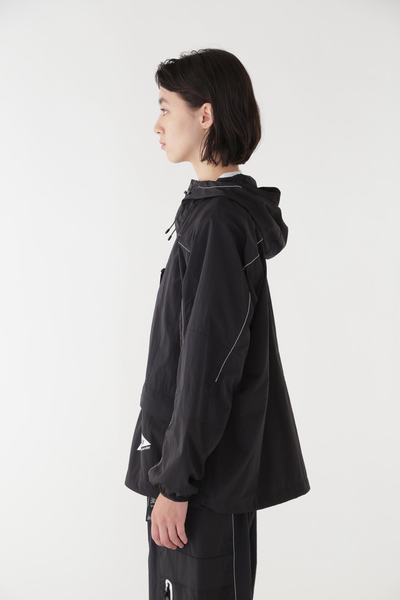 GRAMICCI × and wander PATCHWORK WIND HOODIE