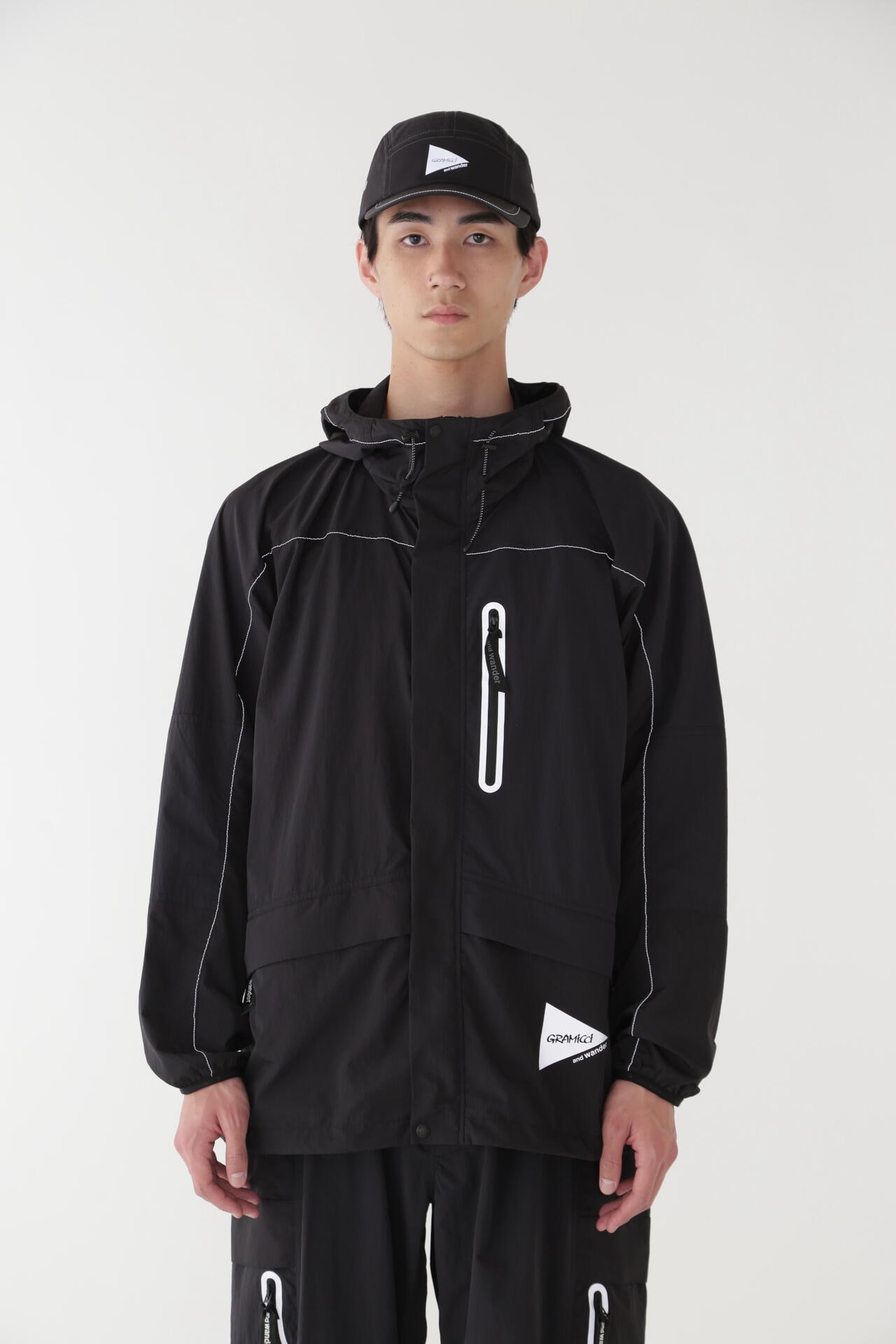 GRAMICCI × and wander PATCHWORK WIND HOODIE | outerwear | and 