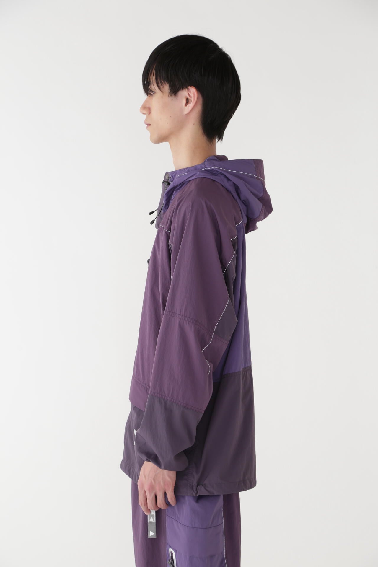 GRAMICCI × and wander PATCHWORK WIND HOODIE