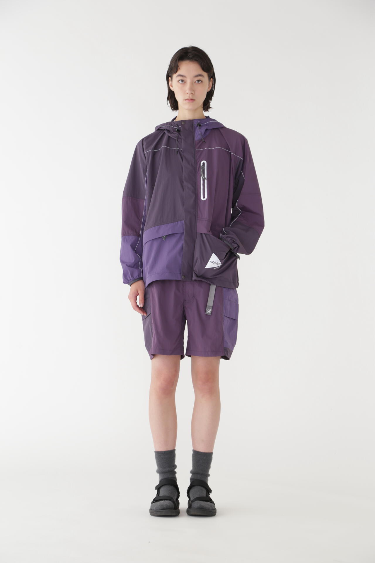 GRAMICCI × and wander PATCHWORK WIND HOODIE | outerwear | and 