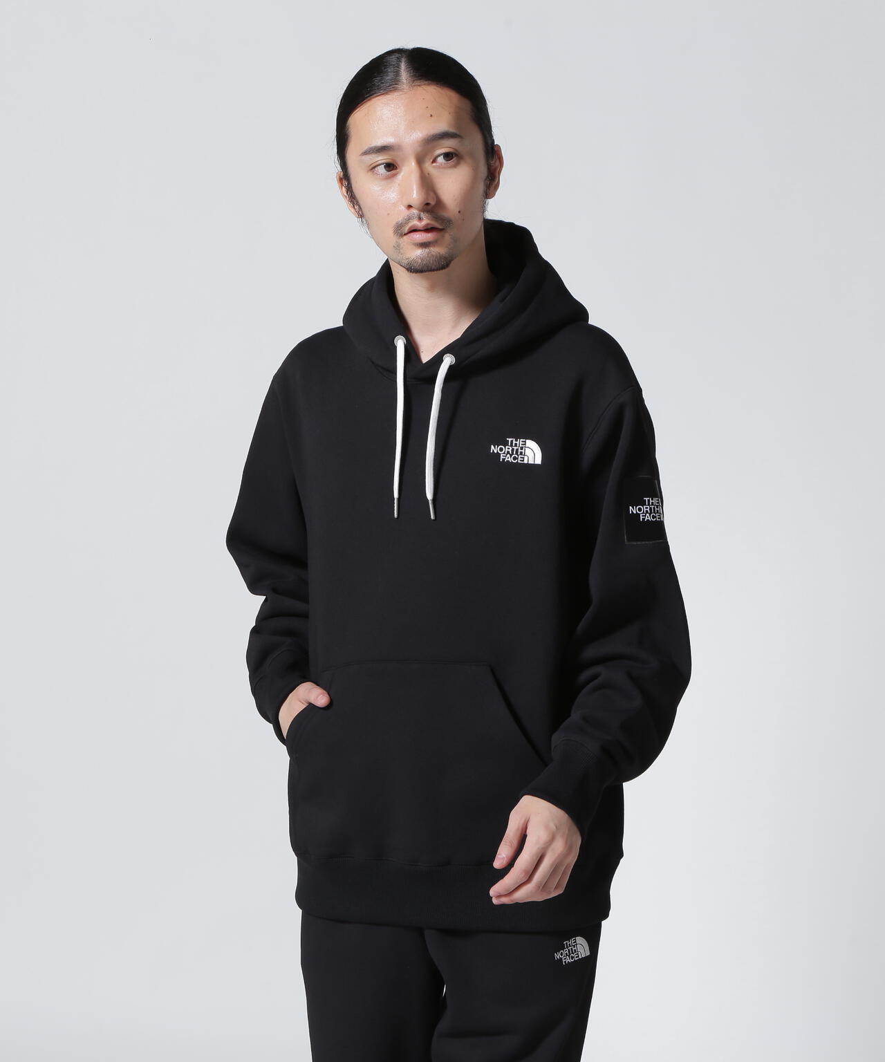 ザ・ノース・フェイス THE NORTH FACE】スクエアロゴフーディ - トップス