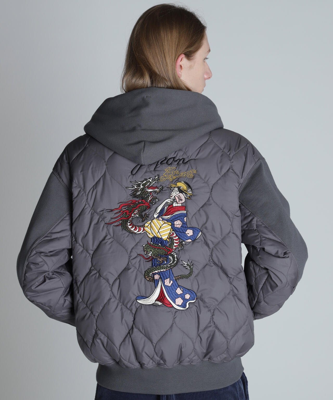 LADY WITH DRAGON QUILTED COMBI. ZIP HOOD