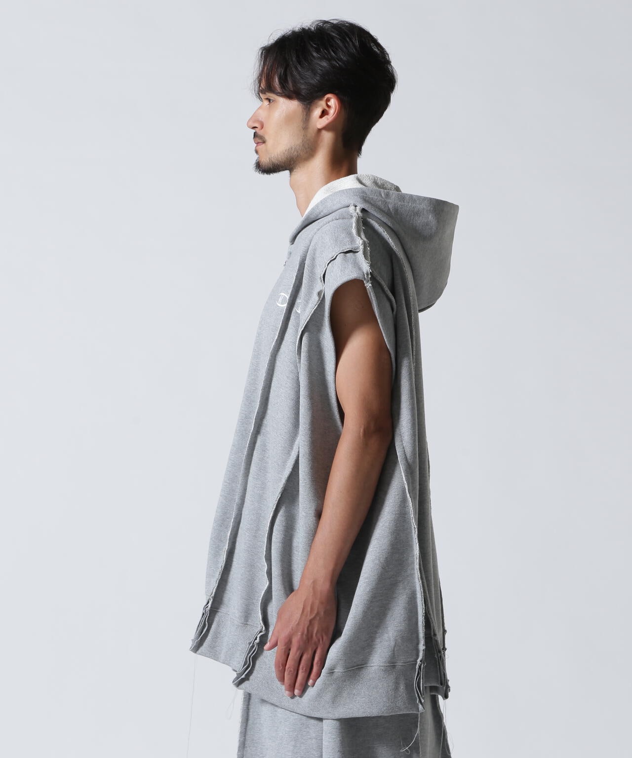 DISCOVERED(ディスカバード) 別注DOCKING NO SLEEVE HOODIE