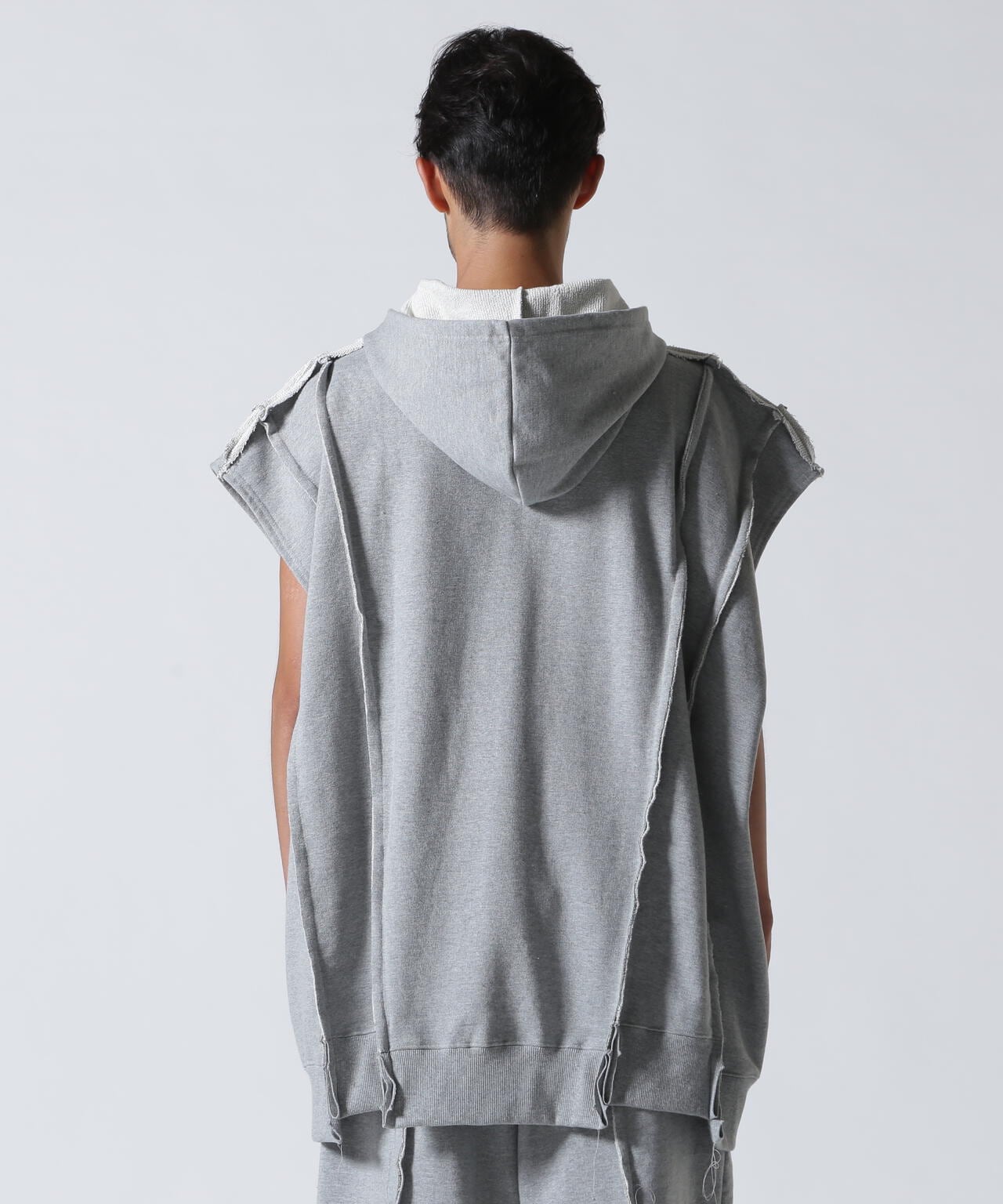 DISCOVERED(ディスカバード) 別注DOCKING NO SLEEVE HOODIE