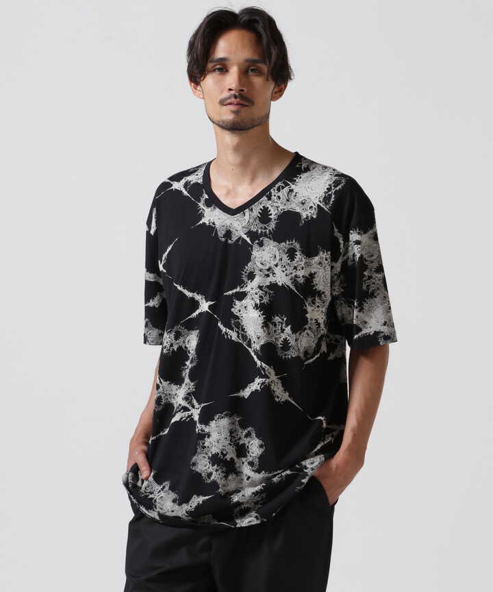 KMRii クロスサーペント ムラ染めロングシャツ｜トップス